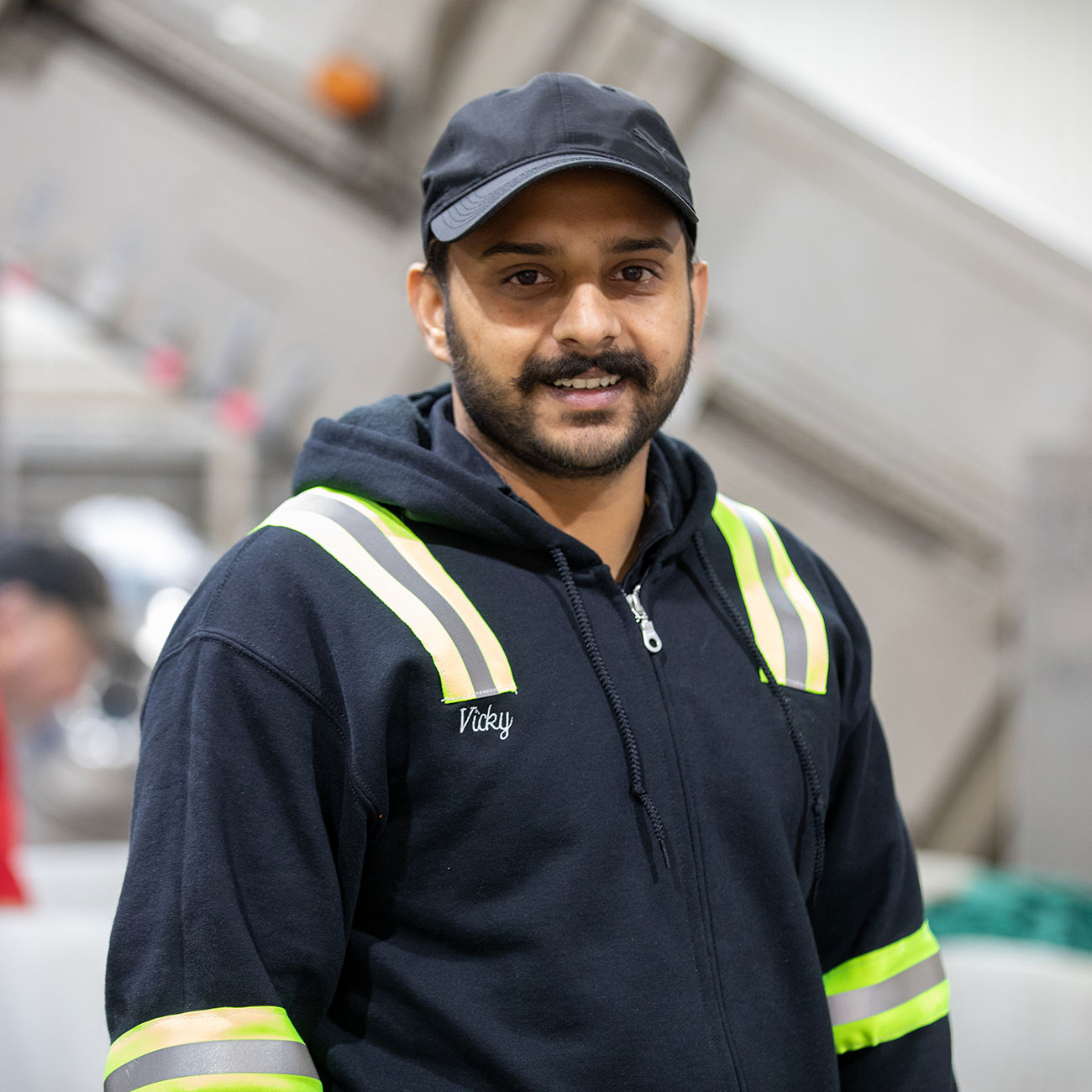 Employee Smiling in Uniform